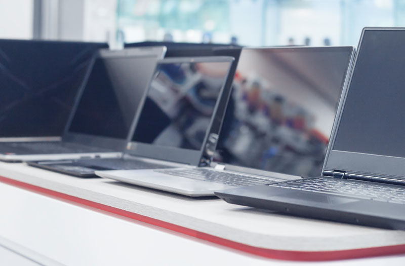 store with multiple laptops on display