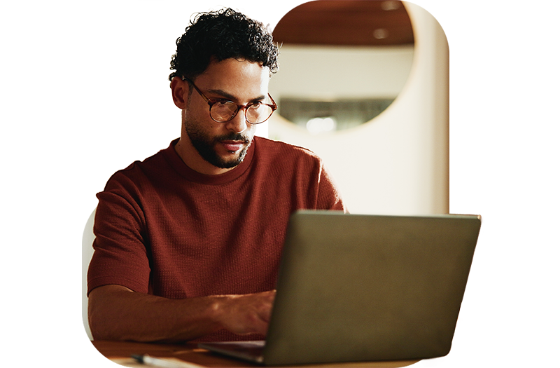 Man typing while working from home