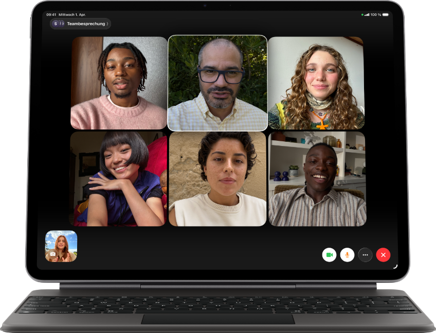 iPad Air, attached to Magic Keyboard, Black colour, Group FaceTime call on screen