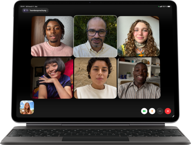 iPad Air, attached to Magic Keyboard, Black colour, Group FaceTime call on screen