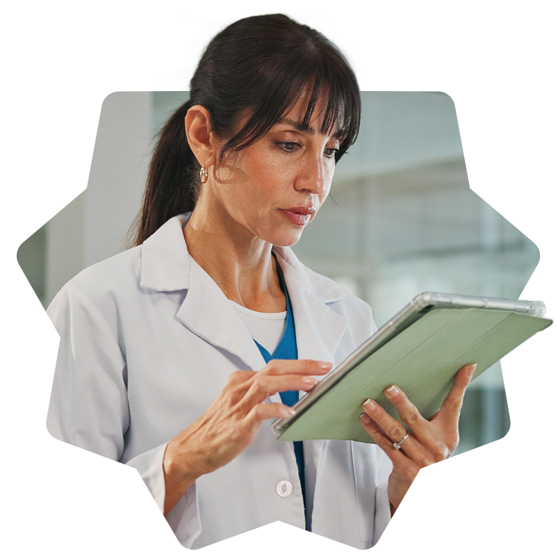Female doctor holding a tablet