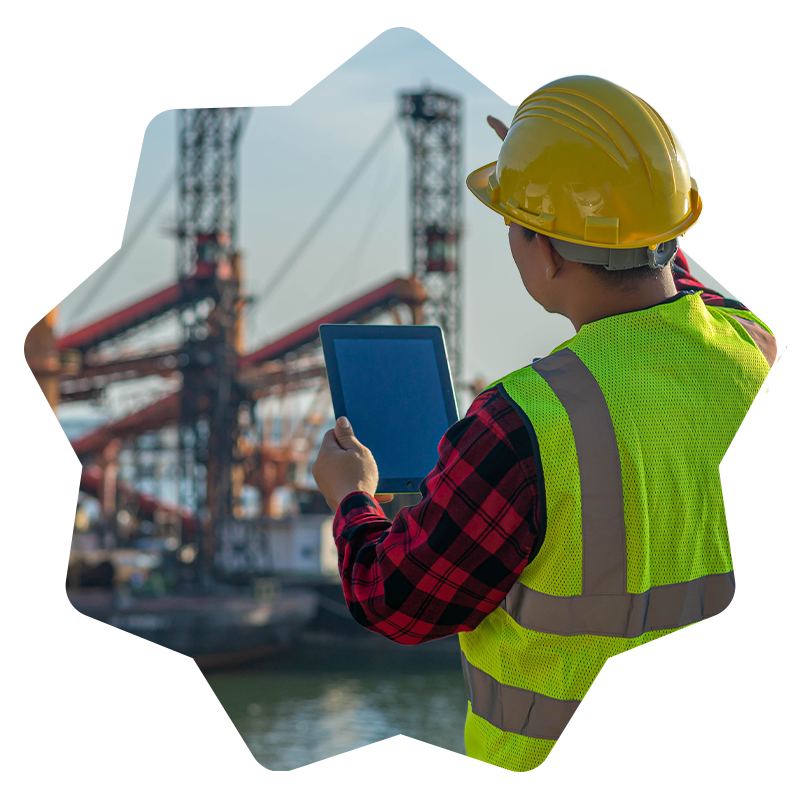 Maritime engineer using a tablet