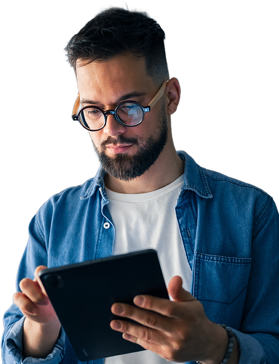 Business man smiling while holding tablet
