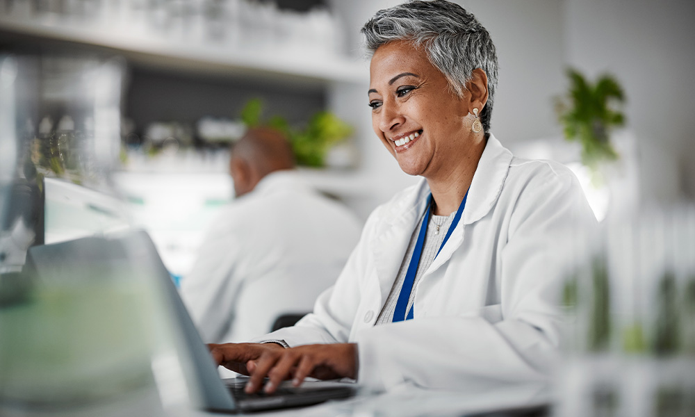 Researcher working on a laptop