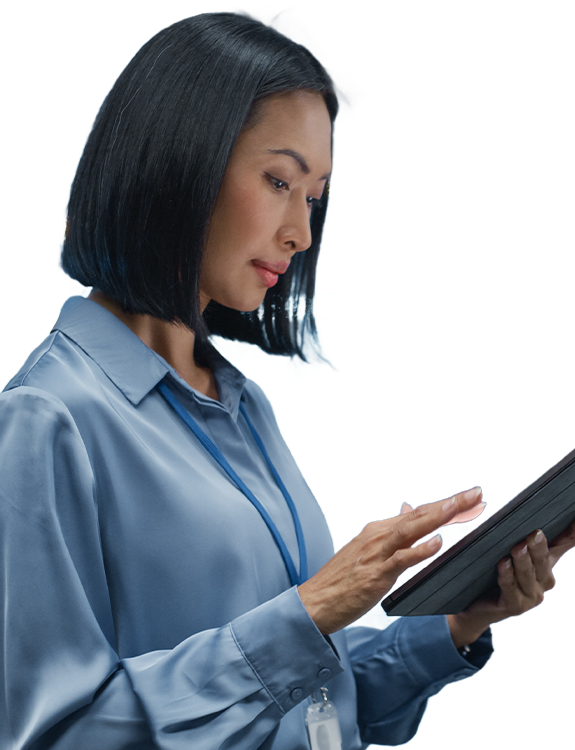 Woman standing while holding tablet