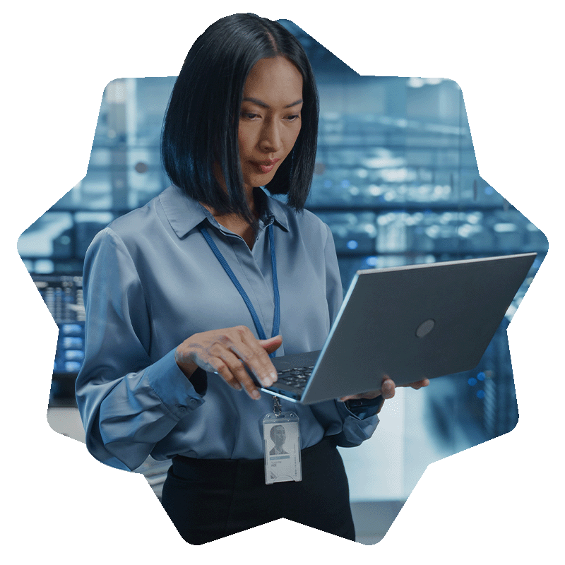 Cybersecurity specialist holding a laptop