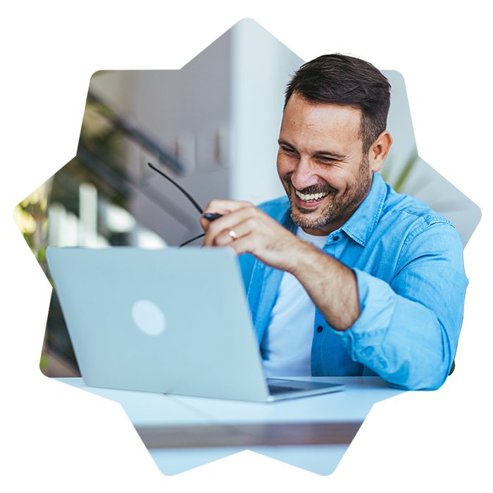 Cheerful man using laptop for a call