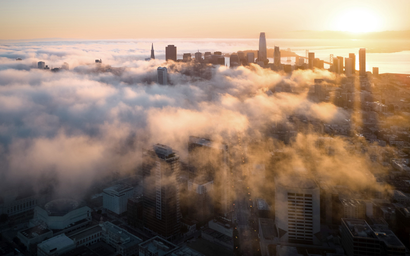 City skyline through clouds