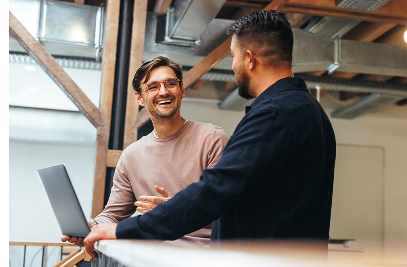 Business professional reviewing regulatory compliance information on computer