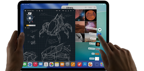 iPad Pro, space black colour, left hand holding device, right hand pointing gesturing to manipulate multiple open app windows, a drawing app with sketches of mechanical designs, photos library of planets and space images, downloads folder files fanned out