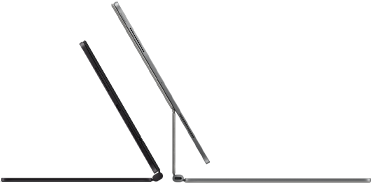 2 iPad Pro devices attached to Magic Keyboard, side exterior, thin profile, space black colour with speakers and USB-C port, tilted half open, silver colour, open, tilted back showing the keyboard’s floating cantilever design, speakers and microphone