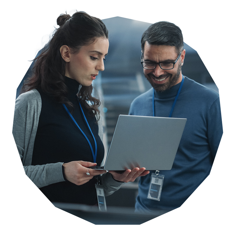 Two IT working in a data centre