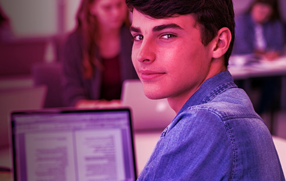 Older student sitting in a classroom
