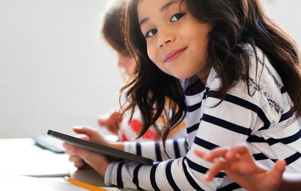 Young student sitting in a classroom