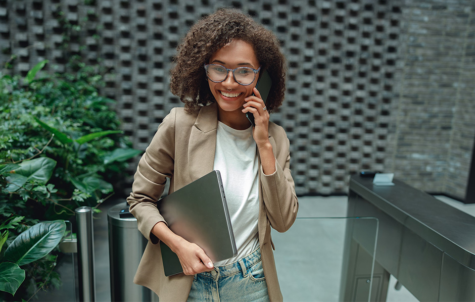 young woman scanning into a modern office