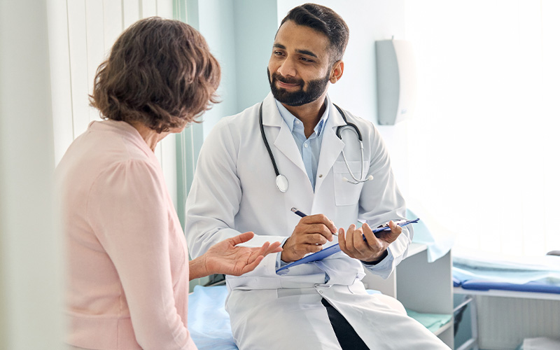 Doctor speaking to patient