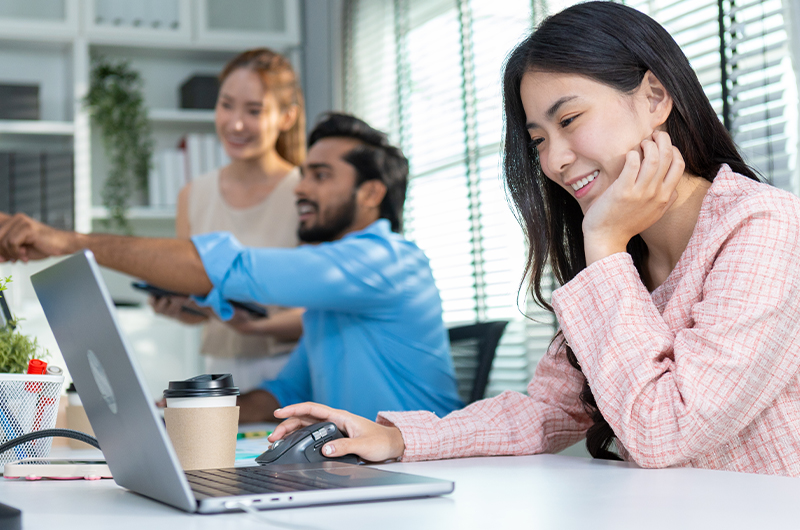 Business professional using working on laptop