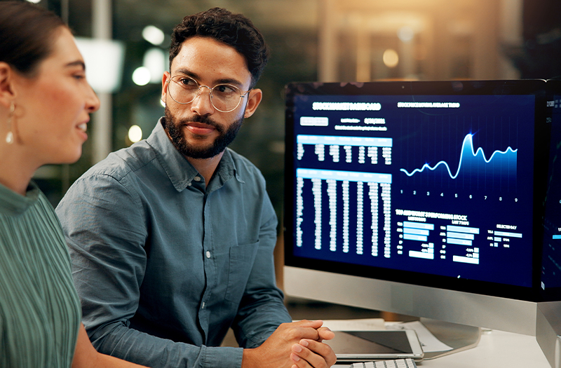 Engineer in glasses analysing data analytics
