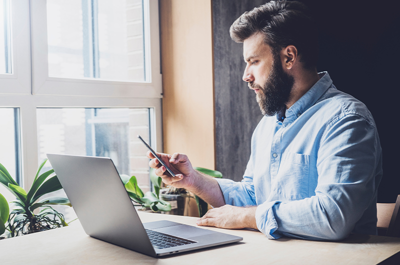 Business professional using working on laptop