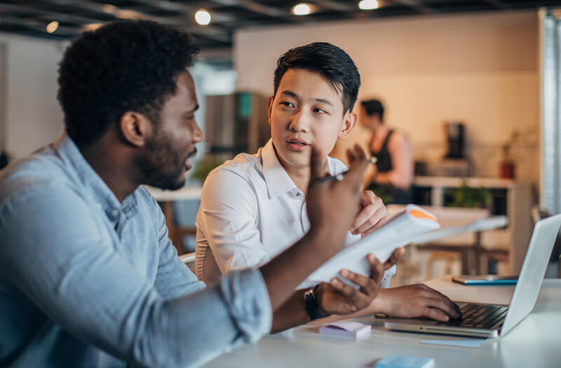 Two people working together