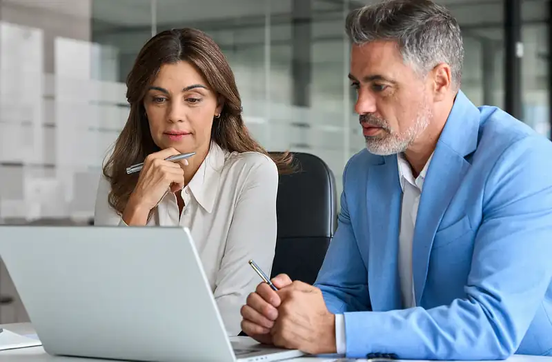 Business professional using automated workflows and self-service tools