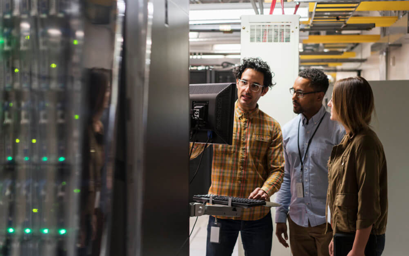 IT Professionals In A Server Room