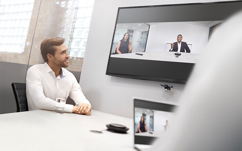 Man in an office using the PanaCast