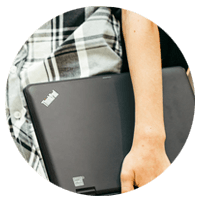 Lenovo Thinkpad under boy's arm