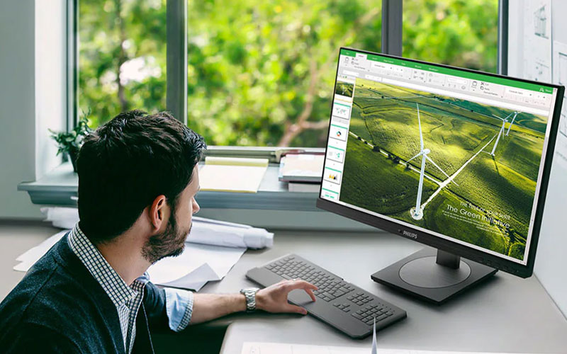 Man working on an eco-friendly Philips display