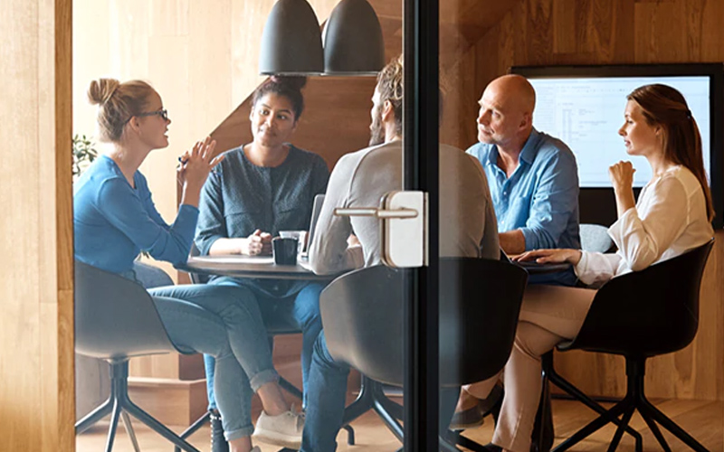 group of people in an office meeting