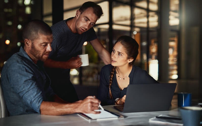 Three coworkers collaborating