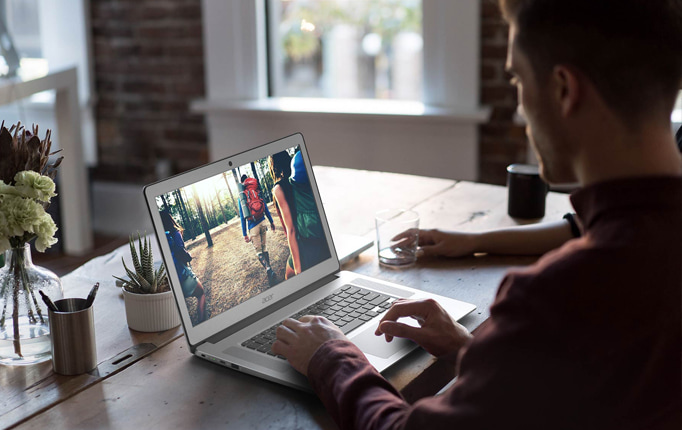 Man working on an Acer Chromebook