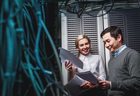 Technicians working in a data centre