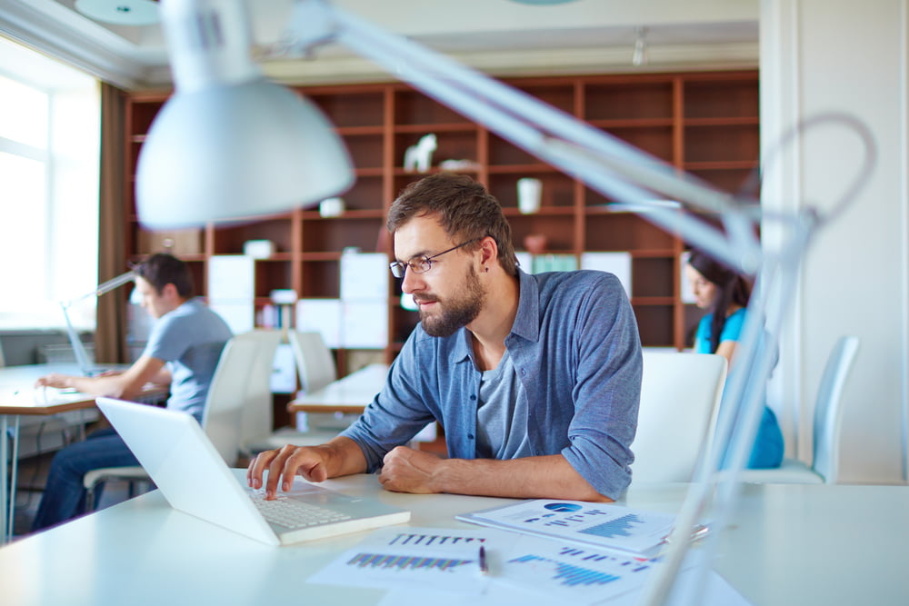 Man working in an open office 