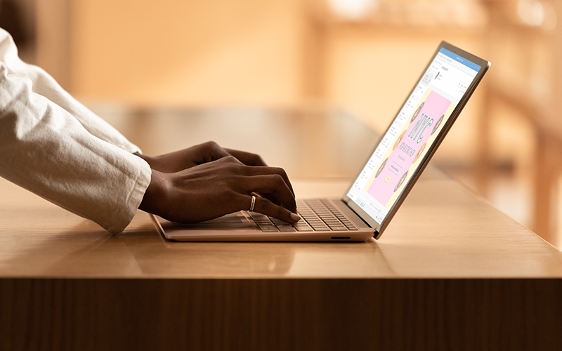 Have the best security with Microsoft 365 A professional using a laptop