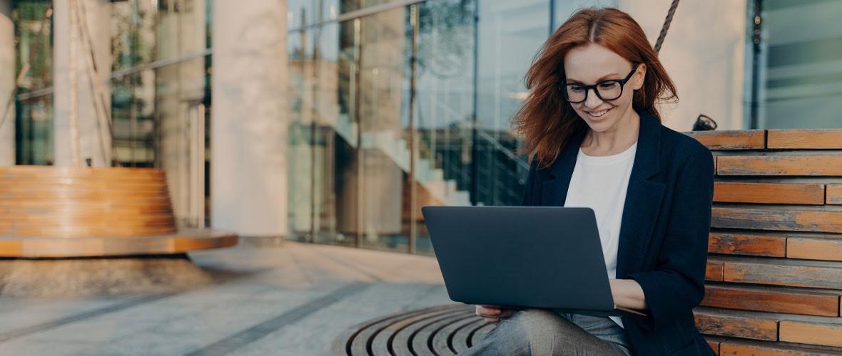 The war for talent Smartly dressed woman working on a laptop