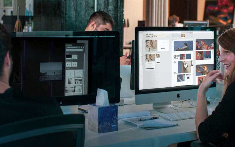 Adobe Creative Cloud for Teams Team working with Creative Cloud