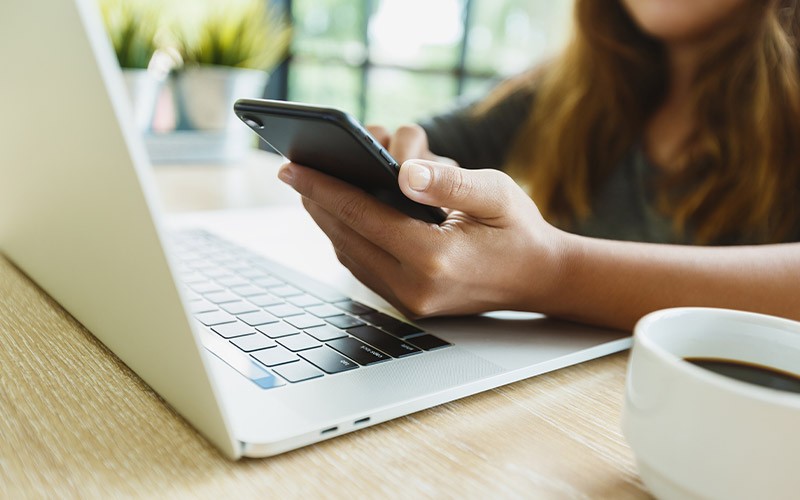 Woman working on a MacBook