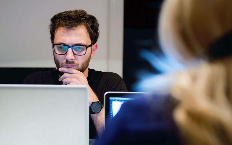 Male studying computer