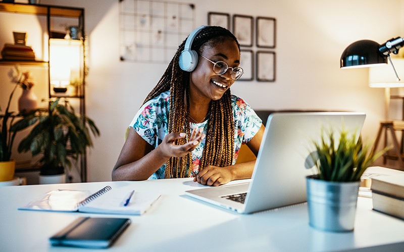 Student smiling while on a video call