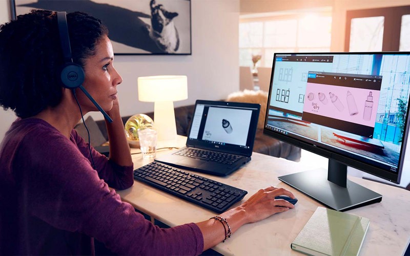 Customise a cloud solution. Woman working on a dell device