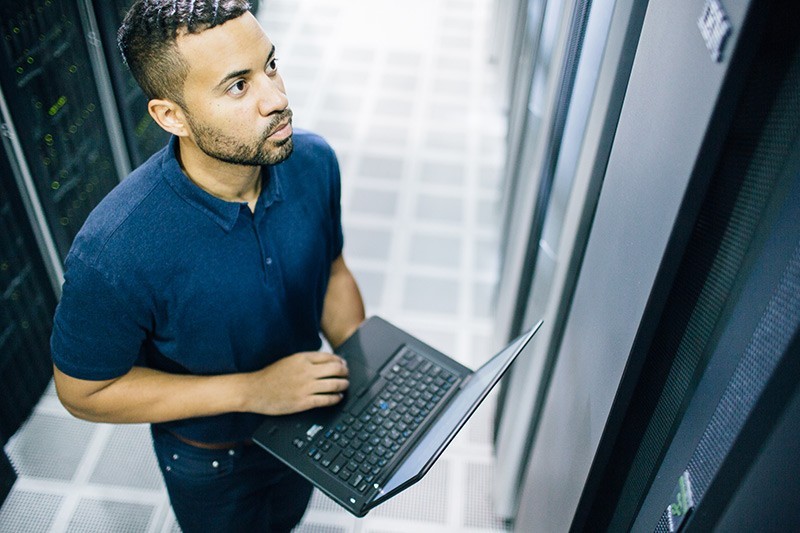 Lack of budget is no problem Man on laptop