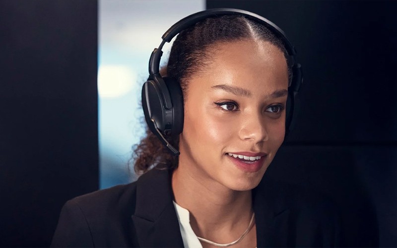 Work your way Woman using an APADT headset