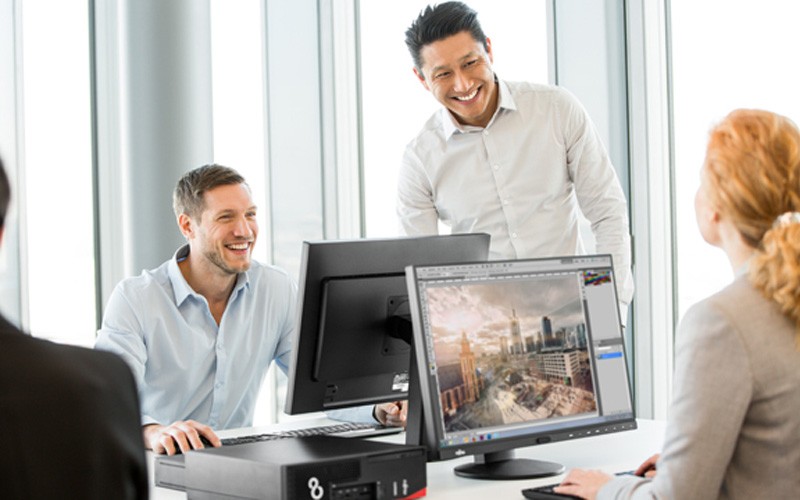 Fully featured and highly expandable PCs that you can rely on Colleagues laughing in an office
