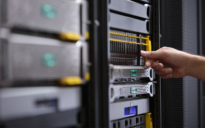 Hyperconverged solutions Close-up of hand touching server device