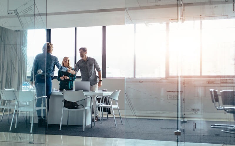 Provide the raw horsepower your business demands Group of people meeting in a modern business room