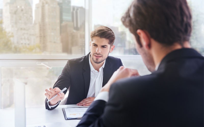 Intel solutions for government Two business men using technology outside