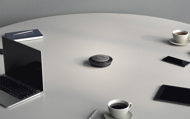 Effortless collaboration with Jabra Speak 750. Speak 750 placed in the middle of a table.
