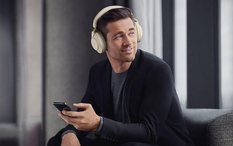Man using Jabra headset from his phone