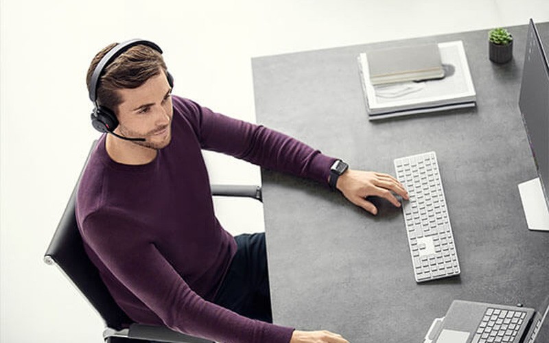 Man using Jabra headset from home